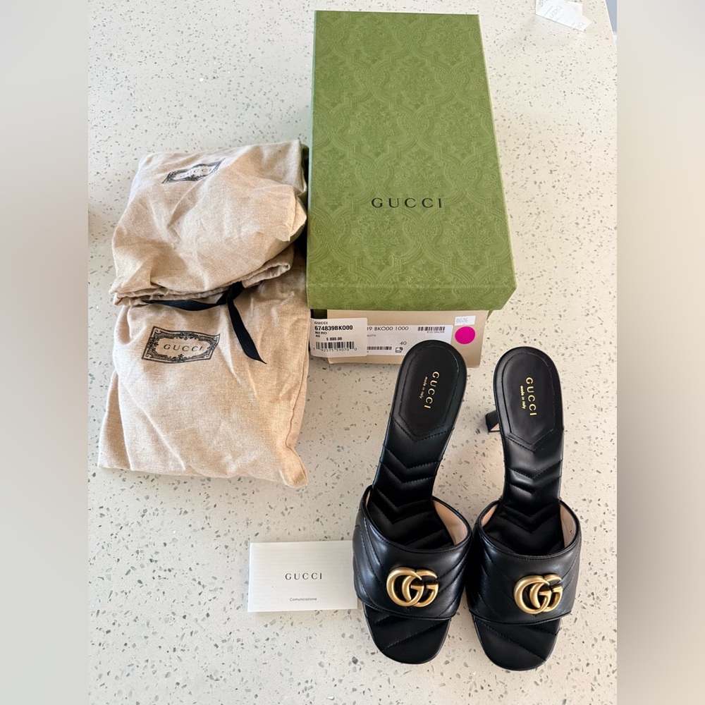 Gucci Black Leather Flats with Gold Accents